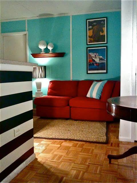 Red And Turquoise Living Room_wall_unit_cocktail_table_ottoman_chair_ Home Design Red And Turquoise Living Room